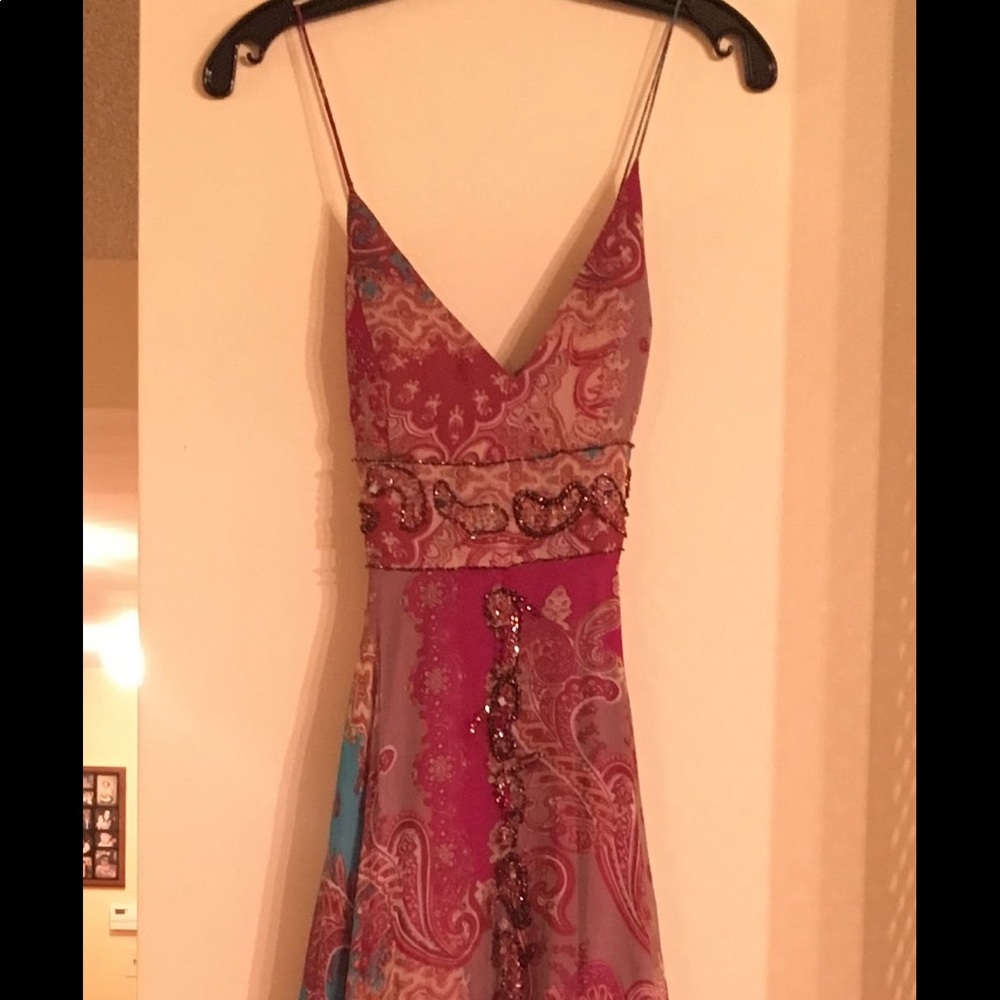 Beautiful beading on the gown- bohemian style and loose fitting- tighter above